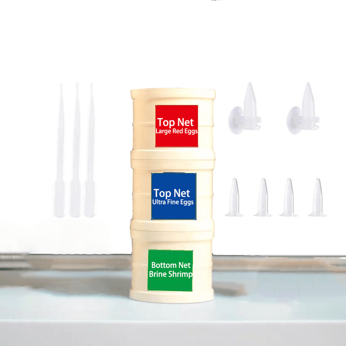3-layer brine shrimp egg separator with stacked cylindrical nets on a towel